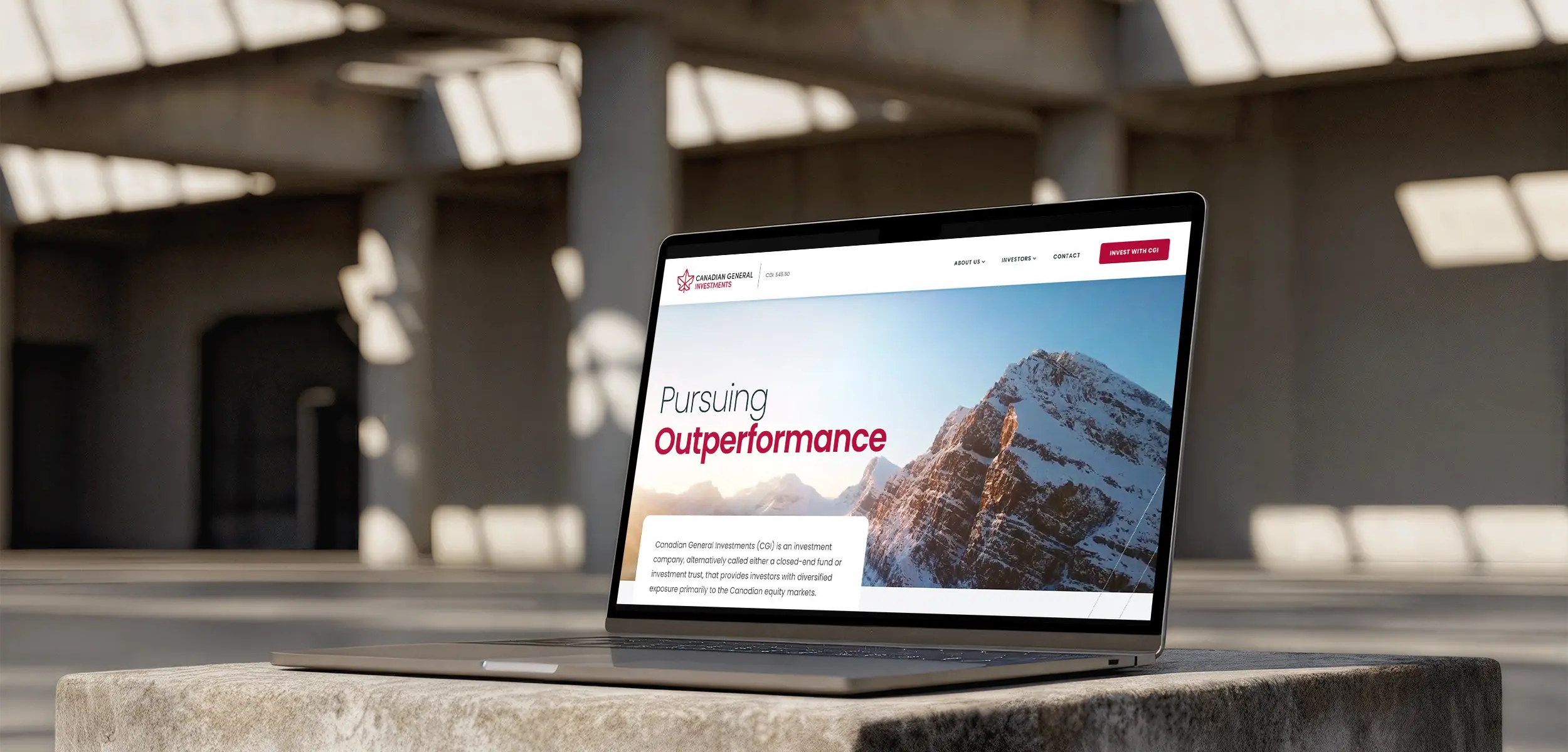 Homepage on a laptop inside an industrial looking room.